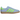 Adidas Gazelle Indoor Clear Sky Solar Green sneakers i vinklad profil med ljusblå mockaöverdel, gröna detaljer och gummisula