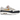 Nike Air Max 1 Olympic sneakers i en vinklad profil med vit ovandel, röda detaljer och det klassiska swoosh-logot på sidan
