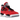 Jordan 4 Retro Toro Bravo sneakers i vinkel med röd mockaöverdel, synlig Air-enhet, svarta detaljer och matchande skosnören