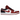 Air Jordan 1 Low Bulls sneakers i sidoprofil med vitt läder, röda paneler, svart swoosh, skosnören och en platt yttersula