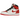 Air Jordan 1 Retro High OG Heritage sneakers i vinklad profil med vit läderovandel, röda detaljer på häl och tåbox samt svart swoosh.