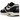 Nike Air Max 1 Patta Waves Black sneakers i sidoprofil med svart vågigt läder, vit mesh och synlig Air-enhet