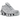Nike Shox TL Chrome sneakers i en vinklad vy med glänsande krom-finish, distinkt svart burstruktur och den karaktäristiska stötdämpande Shox-sulan