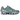 Nike Shox TL Cannon sneakers i en vinklad profil med grå mesh-ovandel, ikoniska Shox-pelare i mellansulan och distinkta neondetaljer.