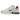 Nike Air Kukini Spiridon Cage 2 Stussy White sneakers i sidoprofil med vit mesh-ovandel, beige detaljer och den ikoniska hälburen för stabilitet