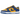 Nike Dunk Low UCLA sneakers i vinklad profil med blå och gul läderovandel, perforerad tåbox och vit mellansula med matchande blå yttersula