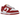 Nike Dunk Low USC sneakers i vinklad profil med den klassiska röda och gula läderöverdelen, vit mellansula och röd yttersula.