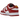 Nike Dunk Low USC sneakers i vinklad profil med klassisk röd och gul läderovandel, vit mellansula och röda skosnören.