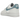 Nike Air Force 1 White Worn Blue Paisley sneakers i vinklad profil med vit läderovandel, blått paisleymönstrat swoosh och klassisk vit sula