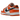 Nike Dunk Low Patent Halloween sneakers sedda från sidan med glänsande svart och orange lackläder, orange swoosh och en matchande orange gummisula