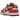 Nike Dunk Low Bronze Eclipse sneakers i en vinklad profil, som visar bruna läderpaneler, en vit mellansula och den ikoniska Nike Swoosh-detaljen.