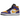 Air Jordan 1 Mid Lakers (2022) sneakers i vinklad profil med lila och gula läderpaneler, vit mellansula och ikonisk svart swoosh på sidan.