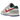 Nike Dunk Low Light Iron Ore Red Blue sneakers i en vinklad vy med grå ovandel, blå swoosh, röda detaljer och vit mellansula