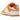 Nike Dunk Low Disrupt 2 Sunrise sneakers i sidoprofil med pastellgula detaljer, mockaöverdrag, vit ovandel och broderad mini-swoosh på sidan.