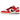 Nike Dunk Low Chicago Split sneakers sedda från sidan med röd och vit läderovandel, delad svart Swoosh-logotyp och en vit mellansula med röd yttersula