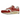 Nike Air Max 1 Red Stardust sneakers i profil med vit mesh-bas, röda mockapaneler och en synlig Air-enhet i mellansulan.