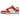 Nike Dunk Low PRM Bacon sneakers i en vinklad vy med rosa mockaöverlägg, vita läderpaneler och en mörkröd Swoosh-detalj