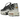 Nike Air Max Plus Toggle Black Silver sneakers i vinklad profil med svart ovandel i mesh, silverdetaljer och ett distinkt snörningssystem.
