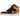 Air Jordan 1 Mid Fat Tongue Black Orange sneakers i sidoprofil med vadderad plös, svarta läderdetaljer samt orange swoosh och yttersula