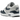 Nike Air Max 1 Armory Navy sneakers i en sidoprofil med marinblå mudguard, vit ovandel och synlig Air-dämpning i mellansulan.