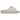 Yeezy Slide Bone sneakers i en vinklad profilvy med en minimalistisk, krämvit gjuten konstruktion och en tjock EVA-skumsula.