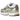 Nike P-6000 Gold sneakers sedda från sidan med lager-på-lager-design i vitt och guld samt en kontrasterande svart Nike Swoosh