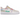 Nike Air Force 1 Low World Tour White sneakers i sidoprofil med vit överdel i läder, klassiska skosnören och en slitstark sula