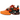 Nike Air Max Plus Homecoming Safety Orange sneakers i vinklad profil, med den ikoniska orange gradienten, plastdetaljer och en robust mellansula.