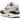 Nike Air Max 1 Olympic sneakers i vinkelad vy med vit ovandel, röda detaljer och blå swoosh samt synlig Air-enhet i hälen